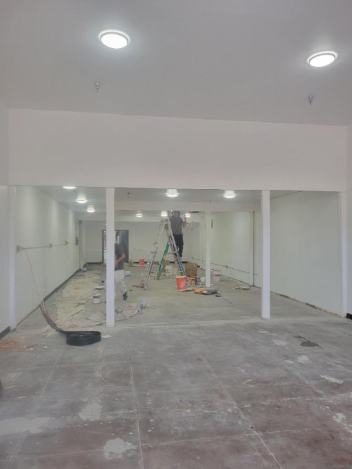 Renovation of interior of retail store; new ceiling and LED lights 